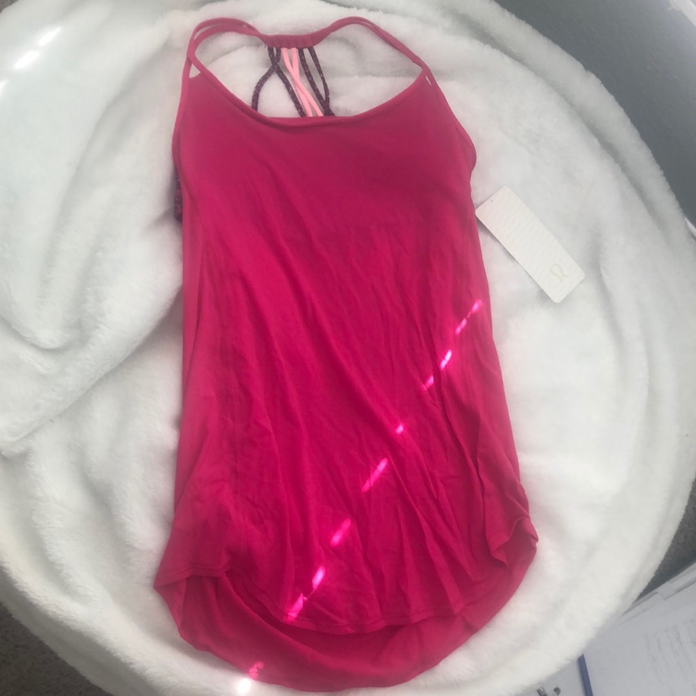 size 8 lululemon lighten up tank; pink